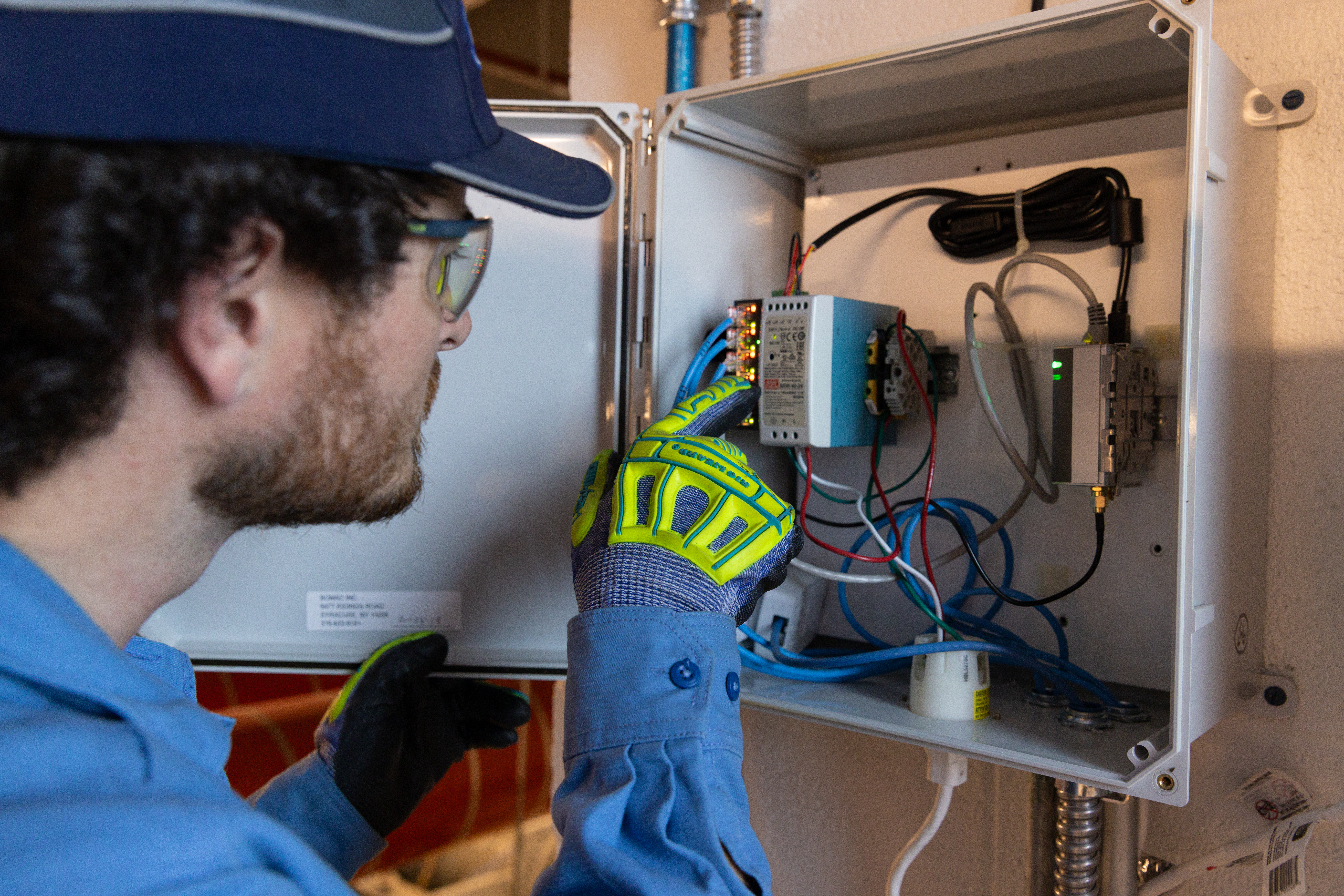 Commercial HVAC technician working on equipment
