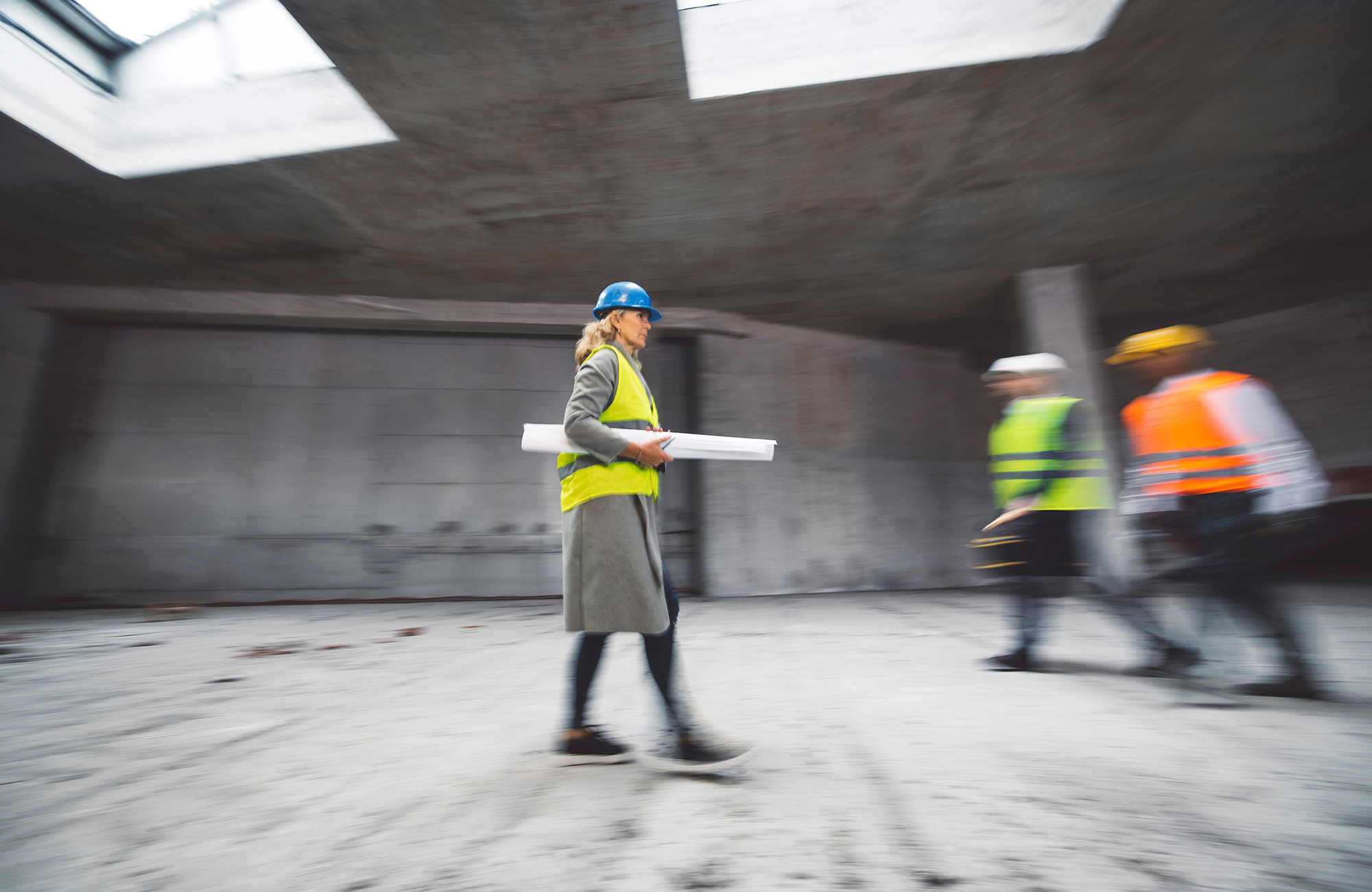 Woman engineer carrying specs